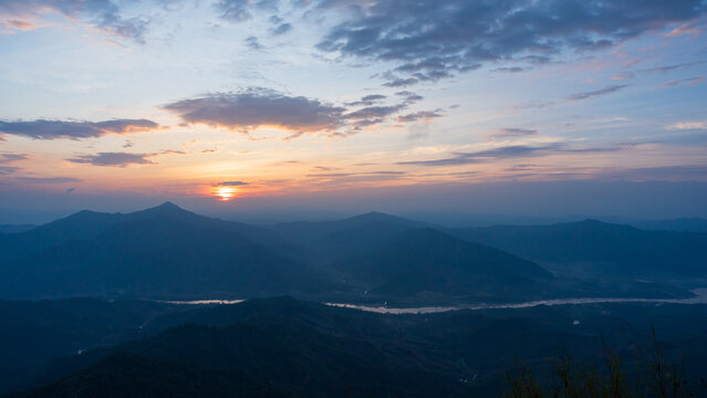 Beautiful sunset in mountains at twilight evening sky