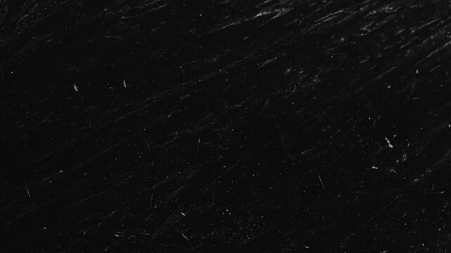 Animated grunge motion texture overlay, Abstract black grunge scratched surface with dark worn texture, grunge gritty dead led black retro vintage textured stop motion overlay loop animation