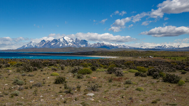 Scenic view of torres del paine national park with snow-capped mountains and blue lake in patagonia