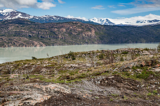 Scenic view of torres del paine national park with snow-capped mountains and blue lake in patagonia