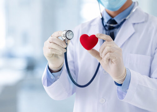 AI generated doctor holding red heart stethoscope representing cardiology healthcare heart examination cardiovascular diagnosis patient care preventive medicine