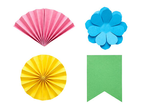 Colorful paper crafts: pink pleated fan, blue paper flower, yellow circular fan, and a green banner, isolated.