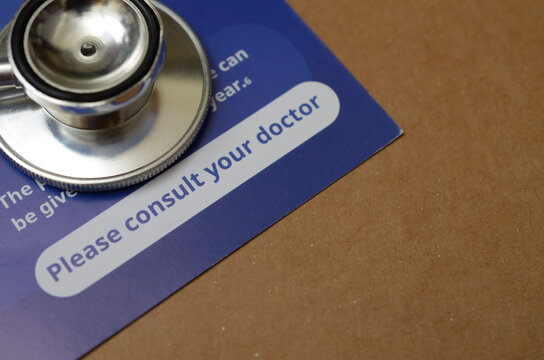 Doctor Consultation and Medical Advice Concept with Stethoscope on Health Leaflet