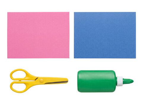 Colorful collage of school and craft supplies: pink paper, blue paper, yellow scissors, and green glue bottle.
