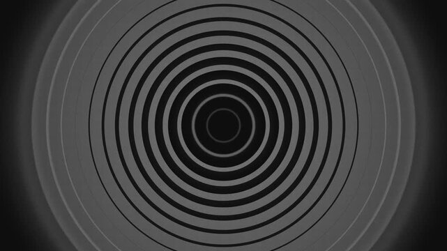 Abstract monochrome pattern featuring concentric circles in dark gray tones