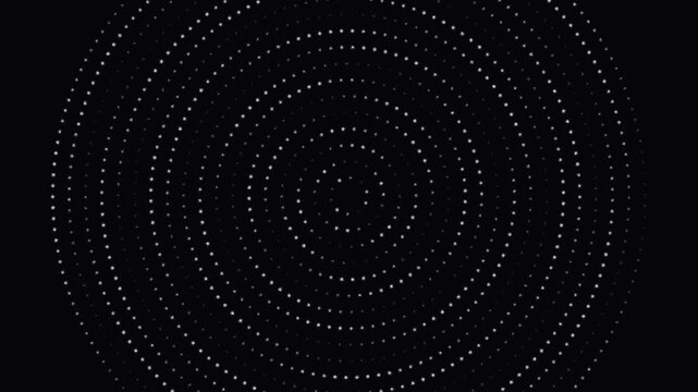 A hypnotic spiral pattern formed by small glowing dots on black background