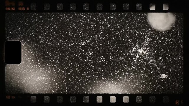 Vintage black and white film strip texture with scratches dust and light leaks for retro background