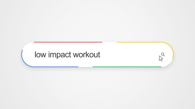 Close-up view of typing "low impact workout" into an online search bar, illustrating fitness research and exercise planning