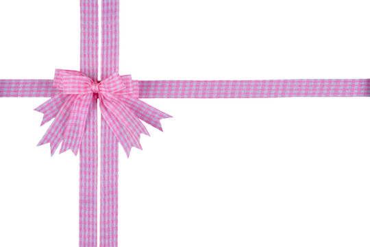 Pink and white gingham patterned gift ribbon cross with multi loop bow isolated on transparent background