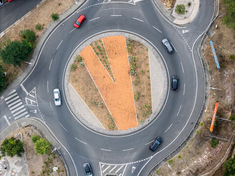 Aerial view of the A5 highway roundabout featuring traffic and road markings in Cascais, Lisboa, Portugal.