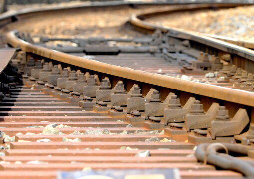 Close up railroad tracks with switch and junction