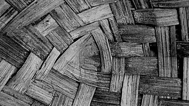 Black Bamboo Weave Motion Texture Dark Center Pattern Background For Video Overlay Seamless Loop
