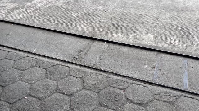 Hexagonal Paving Blocks and Concrete Border Walkway Texture