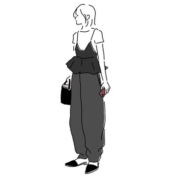 Stylish young woman wearing layered mini T-shirt and peplum camisole with balloon pants and pointed toe mules