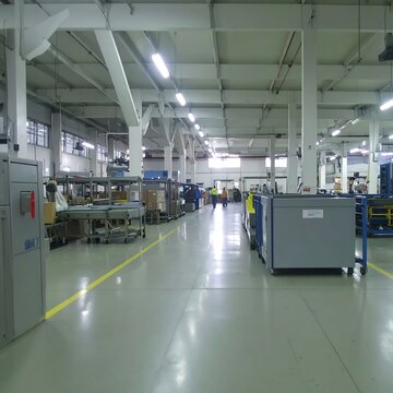 Modern industrial factory interior with machinery and equipment.