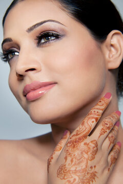 Beautiful woman with mehndi
