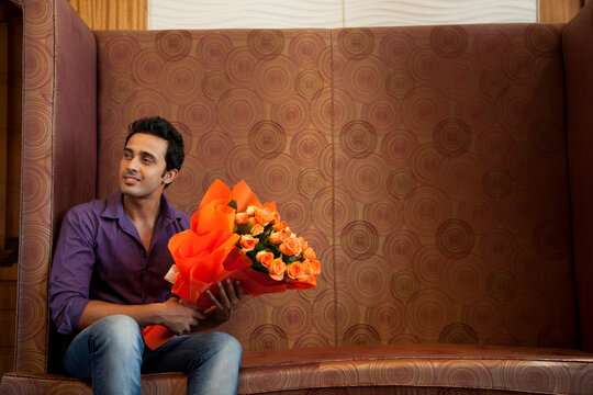 Man with a bouquet of flowers