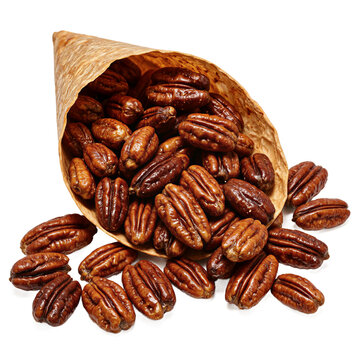 Candied pecan cone. Brown paper bag filled with sugar glazed nuts isolated on a transparent background for autumn holiday treats