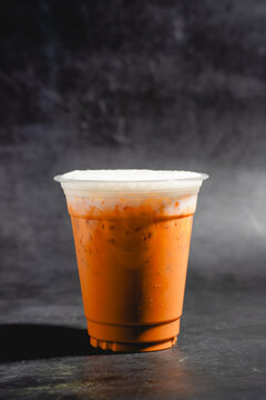 Thai Milk Tea Refreshing Iced Tea Beverage Served in Glass with Ice