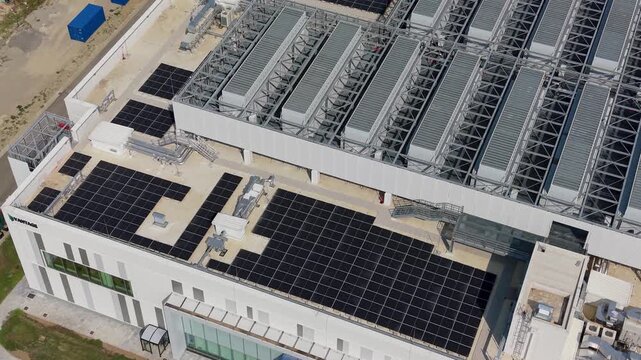 Aerial perspective of a major technology facility near Milan, highlighting the physical infrastructure behind cloud services, enterprise computing, data storage and connected digital business operatio