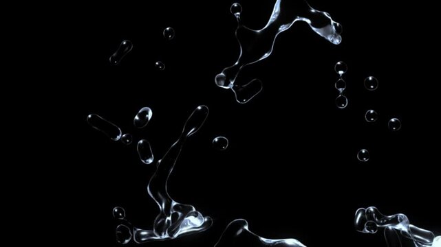Dynamic liquid movement creates flowing streams and scattered water droplets.