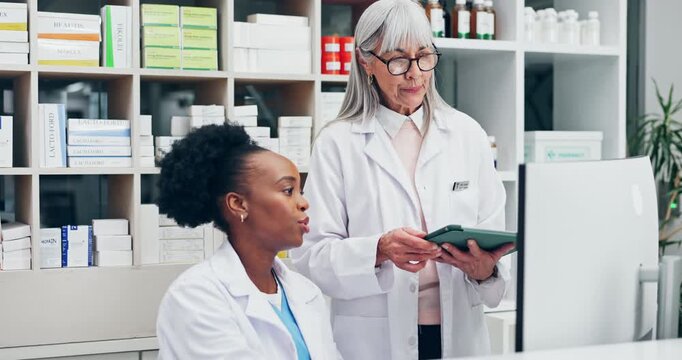 Pharmacist, tablet and women with conversation, computer or medication order in pharmacy. Happy, people and digital tech for healthcare stock, inventory or prescription for telehealth at drugstore