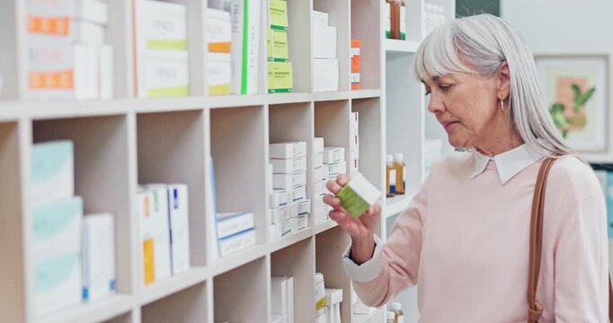 Medication, reading and senior woman in pharmacy with label for symptoms, healthcare or side effects. Pills, medical prescription and elderly person with medicine box for information at chemist.