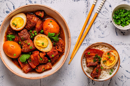 Braised pork belly and eggs. Traditional Southeast Asian cuisine