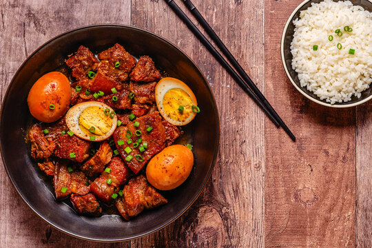 Braised pork belly and eggs. Traditional Southeast Asian cuisine