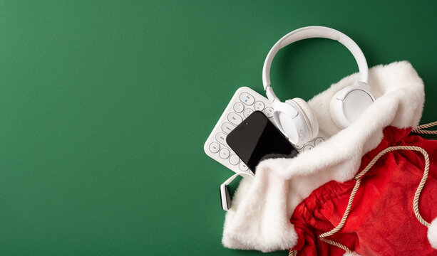 Merry Christmas Santa present sack with headphones phone and keyboard for Happy New Year