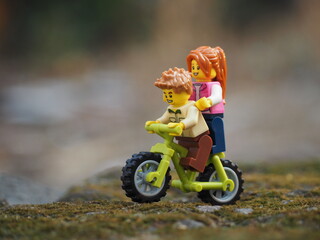 Naklejka premium Indonesia - August 16, 2023 : Mini toy at outdoor with blurred background.
