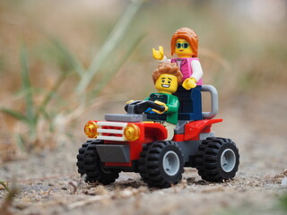 Naklejka premium Indonesia - August 16, 2023 : Mini toy at outdoor with blurred background.