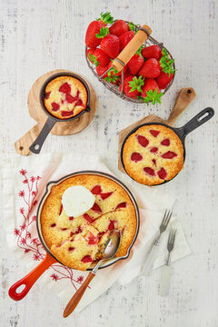 Overhead view of homemade strawberry skillet cake baked in cast iron