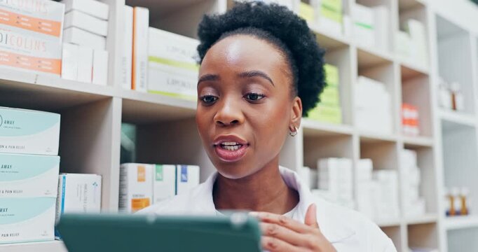 Pharmacist, tablet and video call in pharmacy for Telehealth, healthcare advice or cure in dispensary. Black woman, health worker or employee talking with technology for medication or pharmaceuticals