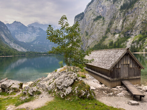 Beautiful Mountain Lake Shore with Fisherman's hut in the Berchtesgaden Alps, Bavaria, Germany &ndash; Scenic Travel and Tourism Concept