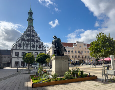 City center with the town hall and theater, featuring the Robert Schuman statue in Zwickau, Saxony, East Germany.