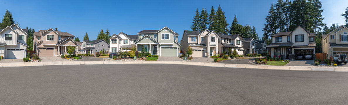 Suburban neighborhood street showcasing new modern american homes