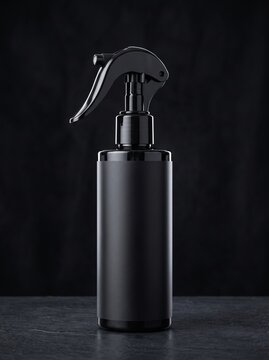 Sleek Matte Black Cosmetic Spray Bottle Mockup on Dark Stone Surface