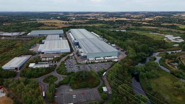 Aerial view of large industrial warehouses and distribution logistics centers at Hams Hall Distribution Park in Warwickshire, England, UK