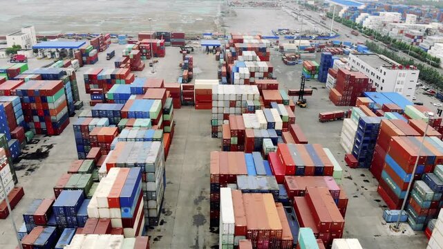 Aerial view of shipping container yard at seaport terminal