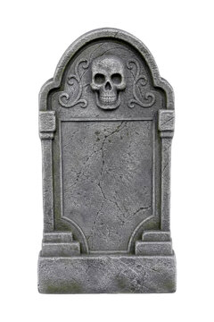 Old weathered stone tombstone with a skull carving and ornate details stands against a clean white background