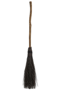Rustic, old-fashioned witch's broom with a gnarled wooden handle and dark, twiggy bristles, isolated on a clean white background