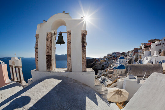 Europe, Greece, Aegean Sea, Cyclades, Thira, Santorini, Oia, View of bell tower in front of the Caldera