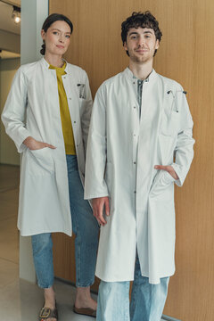 Male and female doctor wear a white coat in a hospital