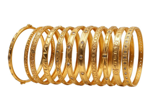 Collection of elegant golden bangles arranged together isolated on white background for jewelry fashion and accessories