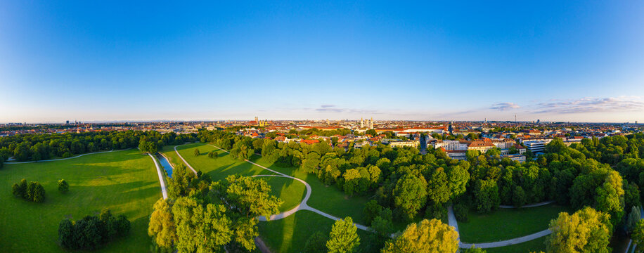 Germany, Bavaria, Munich, Aerial panorama of clear sky over English Garden at dawn