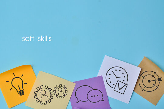 Colorful cards featuring lightbulb, gears, communication, time management, and target symbols, representing soft skills and professional development.