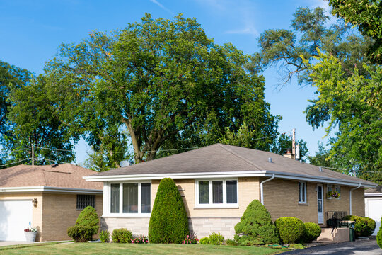 Suburban neighborhood. Private property house. House insurance. Property in neighborhood. Residential neighborhood house in developed area. Property insurance and real estate. Residential suburban