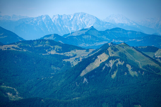 Mountain peak aerial view. Aerial misty landscape. Hazy moody atmosphere. Aerial view of mountain landscape. Landscape panorama. Dramatic misty landscape with mountain in nature environment