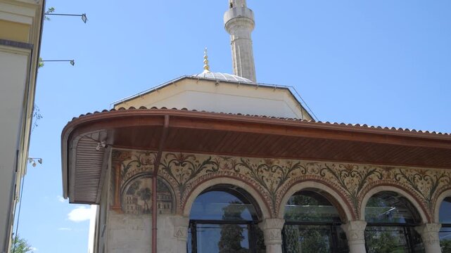 Ethem Bey Mosque In Tirana Albania With Painted Frescoes Arches And Minaret Against Blue Sky